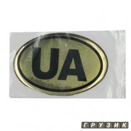 Эмблема силиконовая UA золото-черная 5 см х 3 см